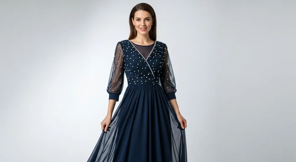 A woman in a dark, elegant dress with subtle detailing.